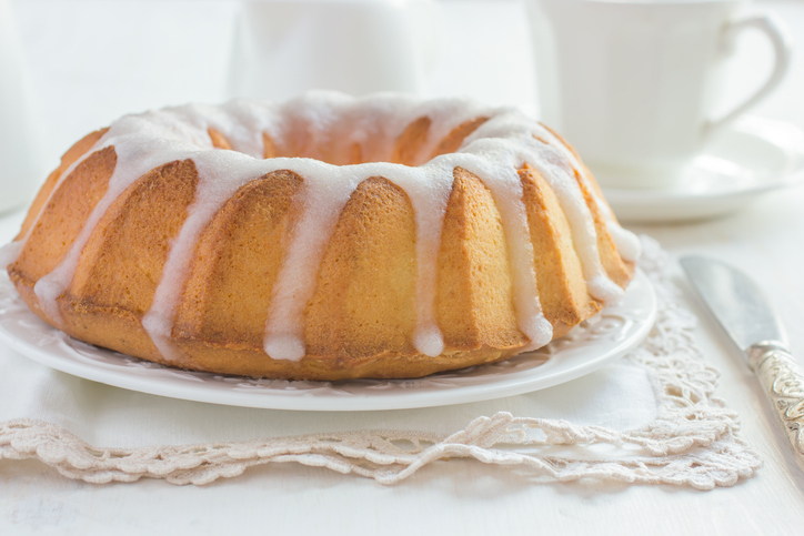 Cake cooling down with buttermilk icing hardening.