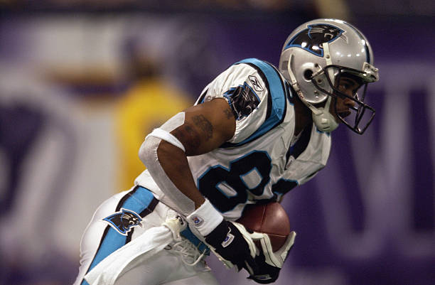 Wide receiver Steve Smith of the Carolina Panthers carries the ball against the Minnesota Vikings during the game on September 22, 2002 at the Hubert...