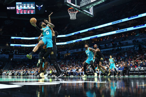 Miles Bridges of the Charlotte Hornets attempts a shot against the Cleveland Cavaliers during the first half of the game at Spectrum Center on March...