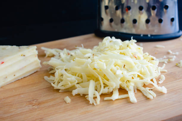 shredded pepper jack cheese - shredded pepper ajck stock pictures, royalty-free photos & images