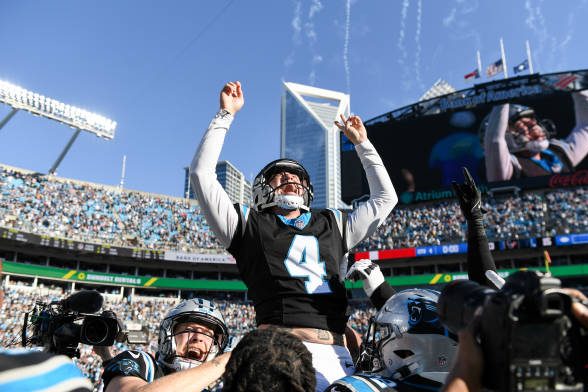 Eddy Pineiro of the Carolina Panthers celebrates after scoring the game winning field goal during the fourth quarter of the game against the Houston...