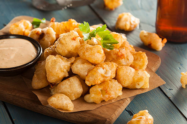 beer battered wisconsin cheese curds - fried cheese curds stock pictures, royalty-free photos & images