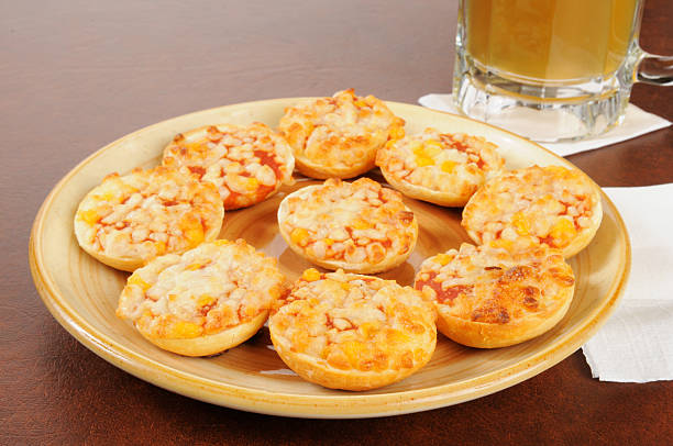 bar snacks - pizza bagel stock pictures, royalty-free photos & images