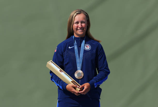 Bronze medalist Austen Jewell Smith of Team United States poses on the podium at the Shooting Skeet Women’s medal ceremony on day nine of the Olympic...