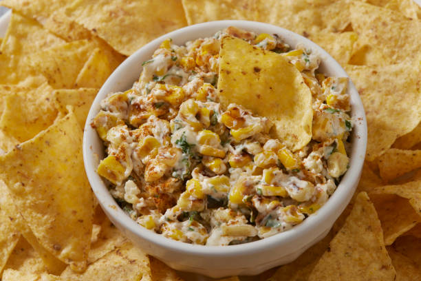 grilled mexican street corn dip - street corn dip stock pictures, royalty-free photos & images