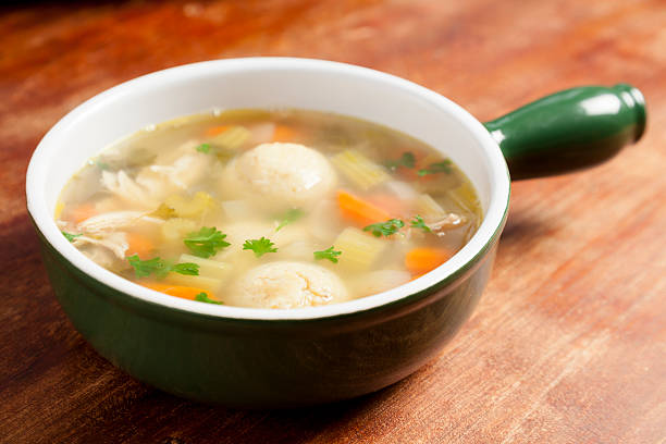 matzo ball soup - matzo ball soup stock pictures, royalty-free photos & images