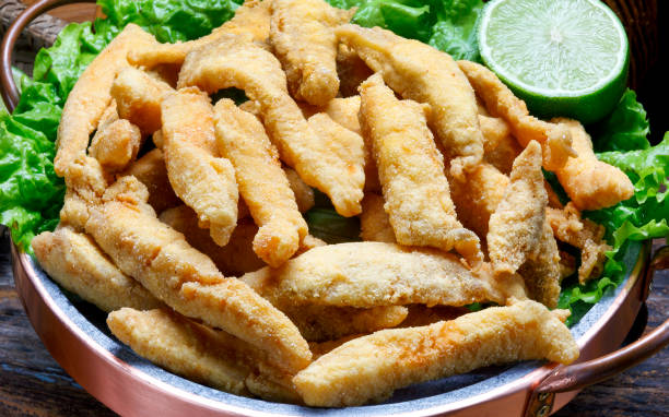 fish sticks breaded with lemon - fish sticks stock pictures, royalty-free photos & images