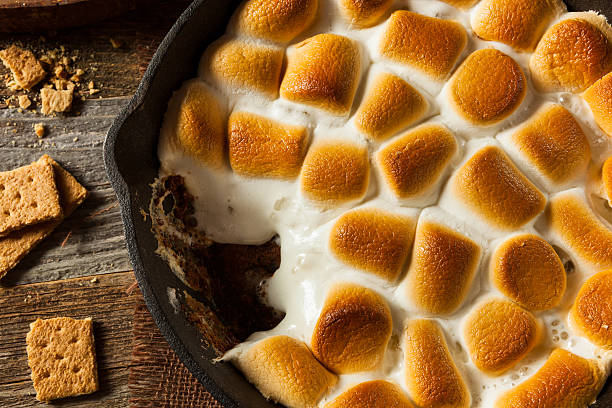 homemade s'mores dip with graham crackers - smores skilelt stock pictures, royalty-free photos & images