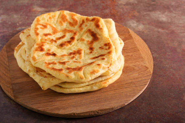 fresh naan flatbreads - naan pizza stock pictures, royalty-free photos & images