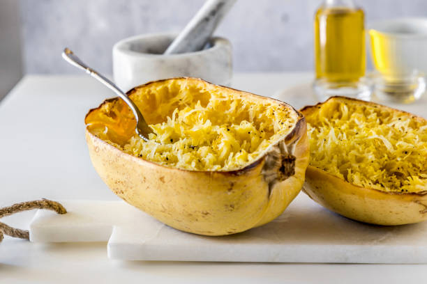 spaghetti squash oven baked - spaghetti squash stock pictures, royalty-free photos & images