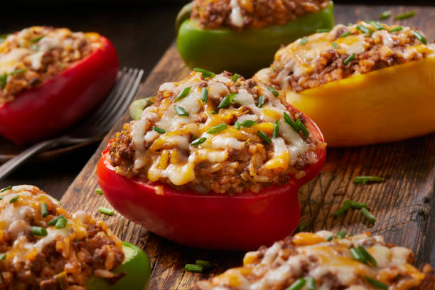 asian style beef and rice skillet - stuffed peppers stock pictures, royalty-free photos & images