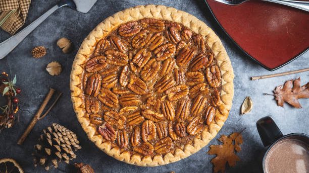 top down of whole pecan pie - pecan pie stock pictures, royalty-free photos & images