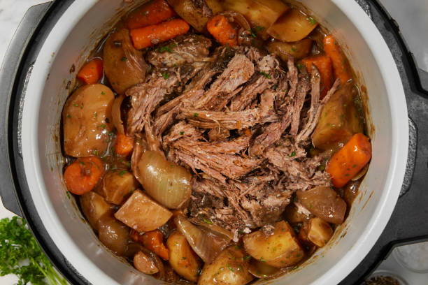 slow cooker pot roast - pot roast dinner slow cooker stock pictures, royalty-free photos & images