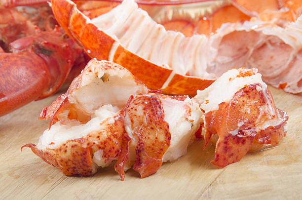 lobster meat on wooden board - lobster meat stock pictures, royalty-free photos & images