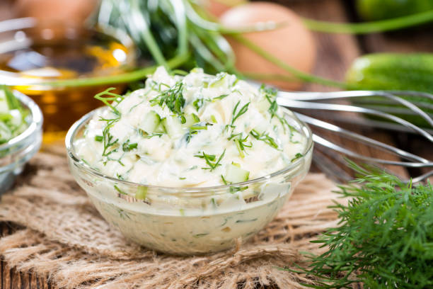 sauce remoulade homemade with fresh herbs on wooden background,romania - dill dip stock pictures, royalty-free photos & images