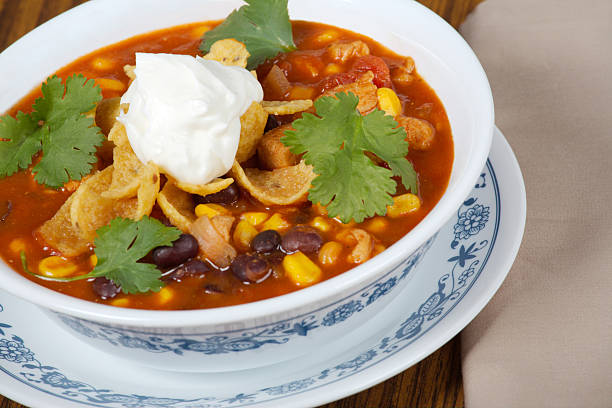 zesty chicken taco soup - taco soup stock pictures, royalty-free photos & images