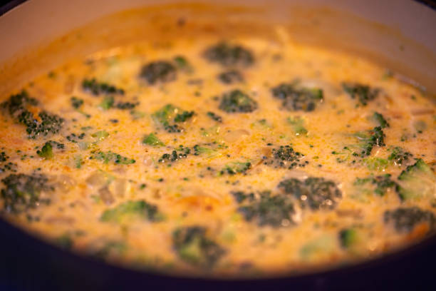 preparing broccoli soup at home - broccoli and rice casserole stock pictures, royalty-free photos & images