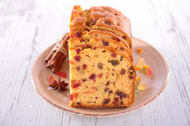 brioche, festive cake with dried fruit and spice - spiced fruitcake stock pictures, royalty-free photos & images