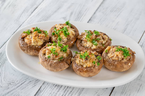 stuffed mushrooms with cream cheese - stuffed mushrooms stock pictures, royalty-free photos & images