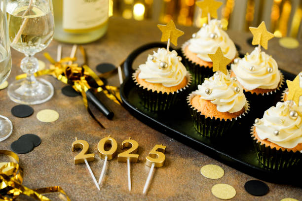 2025 new year eve celebration decoration - champagne cupcake stock pictures, royalty-free photos & images