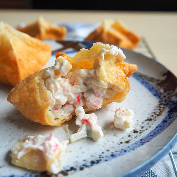 crab rangoons homemade - wonton wrapper crab stock pictures, royalty-free photos & images