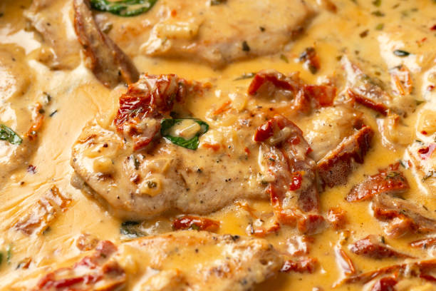 marry me chicken. creamy garlic sun dried tomato chicken. healthy food - marry me chicken stock pictures, royalty-free photos & images