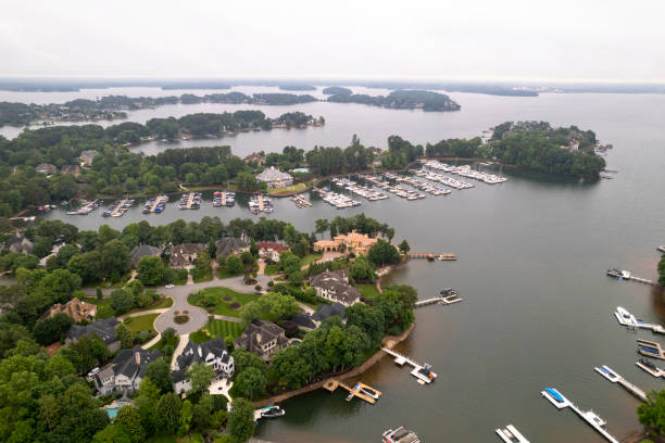 aerial view of calm bay and and residential area - lake norman north carolina bird eye stock pictures, royalty-free photos & images