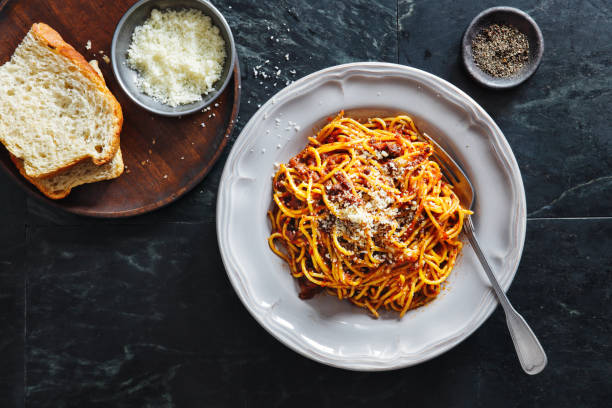 traditional italian meal spaghetti alla bolognese - spaghetti on plate stock pictures, royalty-free photos & images