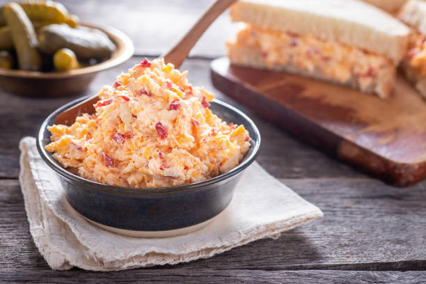 pimento cheese - pimento cheese in bowl stock pictures, royalty-free photos & images