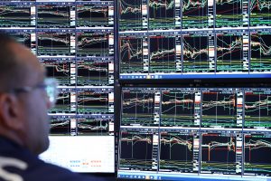 Stock market today: Wall Street ticks to another record as stocks worldwide rally