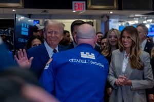 Stock market today: Wall Street’s rally stalls as Nasdaq pulls back from its record