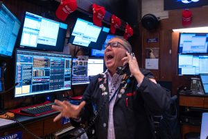 Stock market today: Wall Street sinks after Fed signals fewer rate cuts next year. Dow drops 1,100