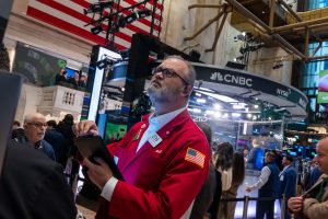Stock market today: Wall Street rises to turn a dismal week into just a bad one