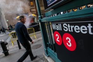 Stock market today: Wall Street ends little changed after giving up a big morning gain