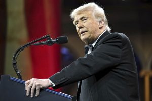 Trump administration moves to cut $100 million in federal contracts for Harvard